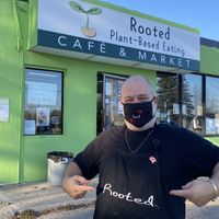 Frank outside at Rooted Plant-Based Eating in Midland