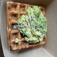 Vegan protein, waffle with avocado  at The Wellness Bar in Hayden