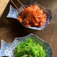 Kimchi and seaweed salad.   Delicious!! at Chi in Vancouver