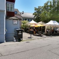 Outdoor seating in the back at Storchen Bistro in Buelach