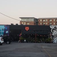Some outdoor seating in front at Neon Tiger in Charleston