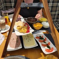 Frühstücksturm mit verschiedenen Aufstrichen und Aufschnitt at Alpendorf Aktivhotel in St Johann Im Pongau