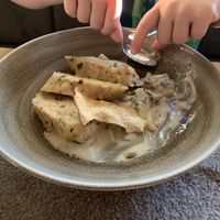 Dumplings with creamy mushroom sauce at Alpendorf Aktivhotel in St Johann Im Pongau