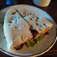 The huge "burgepuri" sandwich they offer. Vegan, filled with beans, vegetables, sauce. at Freeduchio in Batumi