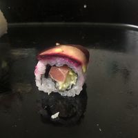Rainbow roll with salmon, mayo and thin slices of sweet potato, avocado and beetroot at Geisha House in Birmingham