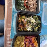 Top to bottom: kale Caesar with coconut rice and added peppers; Brussels sprouts, cider slaw, & broccoli Caesar; spaghetti squash, sweet potato hash, & Thai carrots  at Vessel Kitchen in Salt Lake City