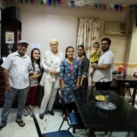 With the owner's family.  at Milan Restaurant in Sohar