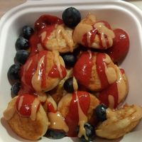 Pancakes with peanut butter and fruit topping at Commune Cafe in Tallinn