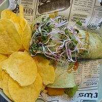 Spinach wrap with vegan chicken and hummus at Brunchbar in Heerlen