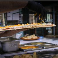 Making the pizza at Pizza Utopia in Ronda