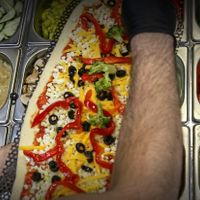 Making the pizza at Pizza Utopia in Ronda