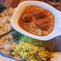 Badami lauki kofta (bottle gourd dumplings) with lemon rice and naan at Coppers in Hythe