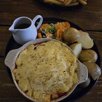 Pie with tomato sauce and potatoes at PIE in Lagos