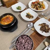 Spicy tofu stew with side dishes and the sweet fried shiitake mushrooms    at Soban Vegan 소반 비건식당 in Busan