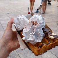 Vegan waffle and chantilly with banana slices and chocolate sauce at Jolly Chocolat in Bordeaux