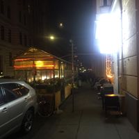 The Vevi outdoor seating at night at Vevi in Vienna