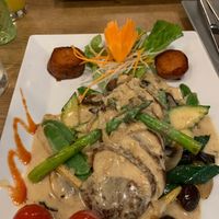 The faux chicken with rosemary soy cream and amazing variety of vegetables at Vevi in Vienna