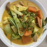 V36 Cary Hoan Kum (curry noodle soup) with rice noodles and soy strips €16.90  at Vevi in Vienna