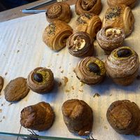 Offering of Saturday 19 April 2025: at the bottom you see kouign amann (a pastry from Bretagne). It’s crispier and sweeter than a croissant. I like it!  at Loaf Sourdough Bakery in Utrecht