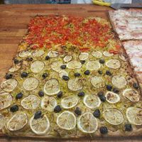 Lemon leek olives and cherry tomatoes and leeks at Prima la Materia in Rome