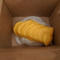 Mango sticky rice.  It looks like goop, but those are individual slices of mango. at Ocha Thai Kitchen and Cafe in Centreville