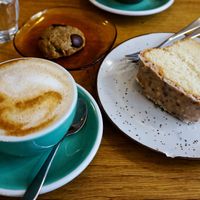 Flat White + Yogurt cake + Pistachio cookie at Amendūla Café in Paris
