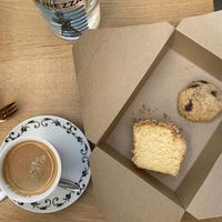 Almond cake cookie and organic coffee  at Amendūla Café in Paris
