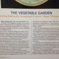 Sign on the entrance wall explaining Vegetable Gardens's origins at The Vegetable Garden in Silver Spring