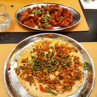 Gobi manchurian and masala papad. Both vegan, both awesome. at Krishna Vilas in Eindhoven