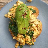 Tofu Scramble on Sourdough with chilli flakes and avocado at Claire's Wholesome Kitchen in Springfield Central