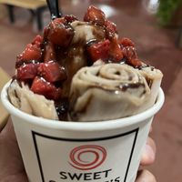 Vegan Vanilla Rolled ice cream with strawberries and vegan chocolate fudge   at Sweet Charlie's in Rehoboth Beach