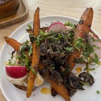 Tostada with white beans cream and veggies  at NEØ Coffee House in Barcelona