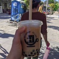 Hojicha tea latte with oat milk and boba at Wake Cup in San Francisco