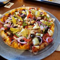 Pizza with a bunch of veggies at Pizza My Heart in Monterey