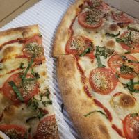 Vegan pizza by the slice at Pizza My Heart in Monterey