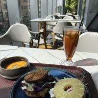 Carrot soup and pineapple burger and monk fruit drink   at Loving Hut 愛家 - Tseuk Luk in Kowloon