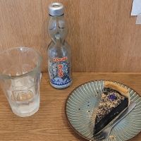 Black sesame flan and ramune lemonade. at Mori Cafe in Paris