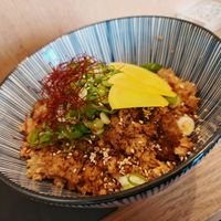 Teriyaki don

Large bowl of rice topped with flame-grilled vegetable mince and teriyaki sauce, melting onions, cebette, takuan (daikon radish pickles), togarashi (sweet chilli st at Mori Cafe in Paris