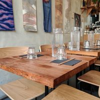 Seats inside at Mori Cafe in Paris