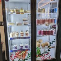 Deli case desserts and drinks at Planticeria in Panama City