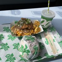 Burger, cluckin fries and a drink (over £20) at Oowee Vegan in North London