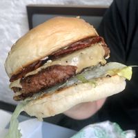 Moving Mountains Burger with Bacon  at Oowee Vegan in North London