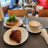 Croissant and avotoast with a beautiful latte at À la Lo in Stockholm