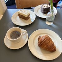 Cake, croissant and coffee   at À la Lo in Stockholm