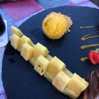 Pineapple with mango-passion fruit sorbet. at Stelleplas in Heinkenszand
