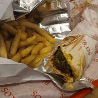 Regular falafel wrap & chips at Biblos in Bristol