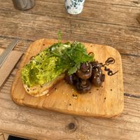 Smashed avo with mushrooms and mocha with vegan choc powder  at Papaya in Lennox Head