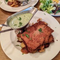 schnitzel with green sauce at Zum Eichkatzerl in Frankfurt