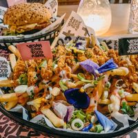 rainbow fries and the McCruelty free at Vegan Junk Food Bar - El Born in Barcelona