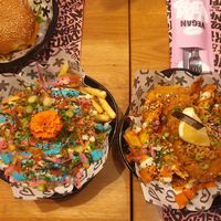 Rainbow fries and fish and chips at Vegan Junk Food Bar - El Born in Barcelona